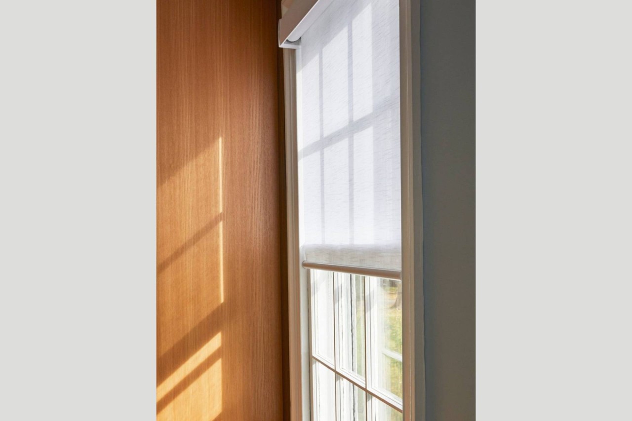 Hunter Douglas Designer Solar Shades on a tall window near Monroe Township, New Jersey (NJ)